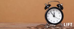 Alarm clock with coins